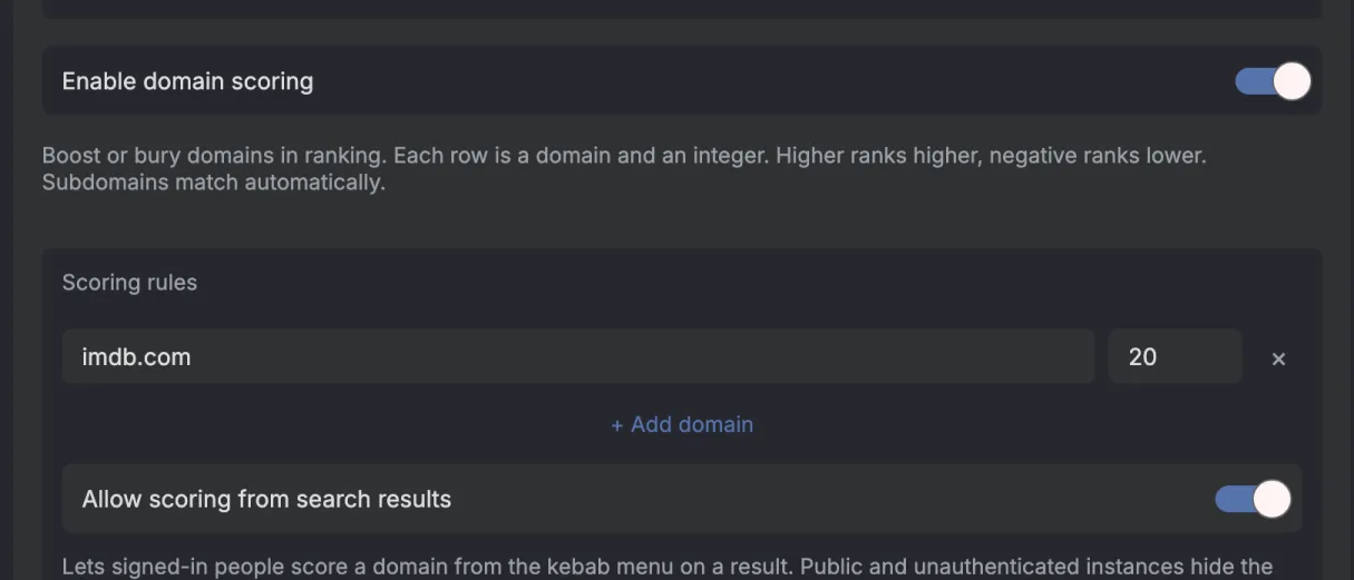 The domain scoring section. Enable domain scoring is switched on. Under Scoring rules there is one row with imdb.com and 20 and a cross to remove it, a + Add domain link, and Allow scoring from search results is switched on.