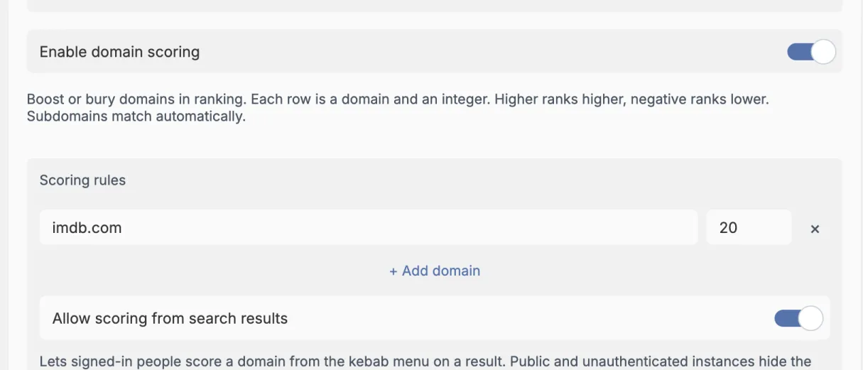 The domain scoring section. Enable domain scoring is switched on. Under Scoring rules there is one row with imdb.com and 20 and a cross to remove it, a + Add domain link, and Allow scoring from search results is switched on.